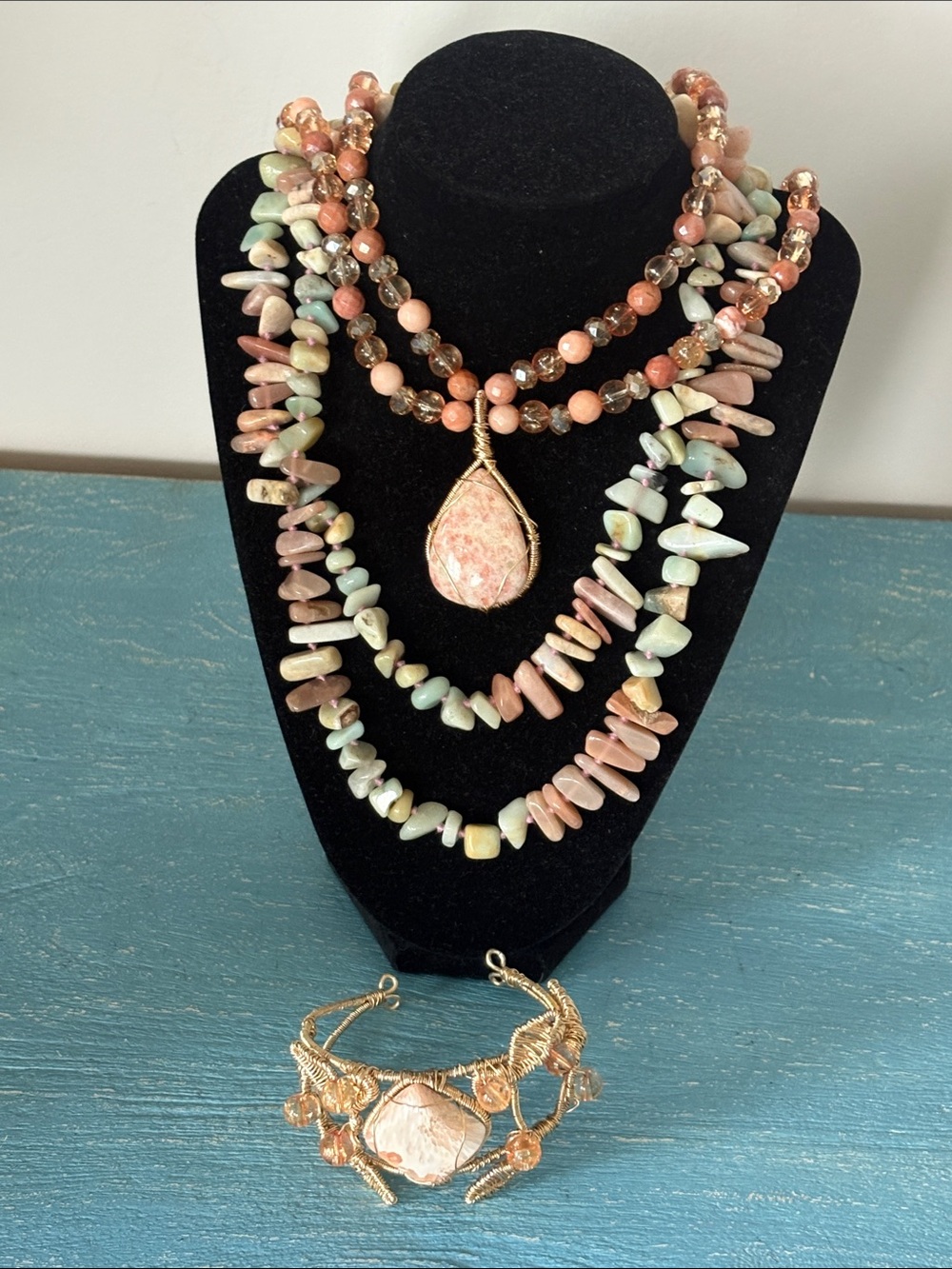 Hand strung and wire wrapped byOKO creations Sunstone necklace and bracelet set